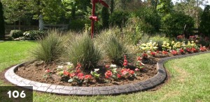 stamped concrete landscape borders around beautiful summer garden