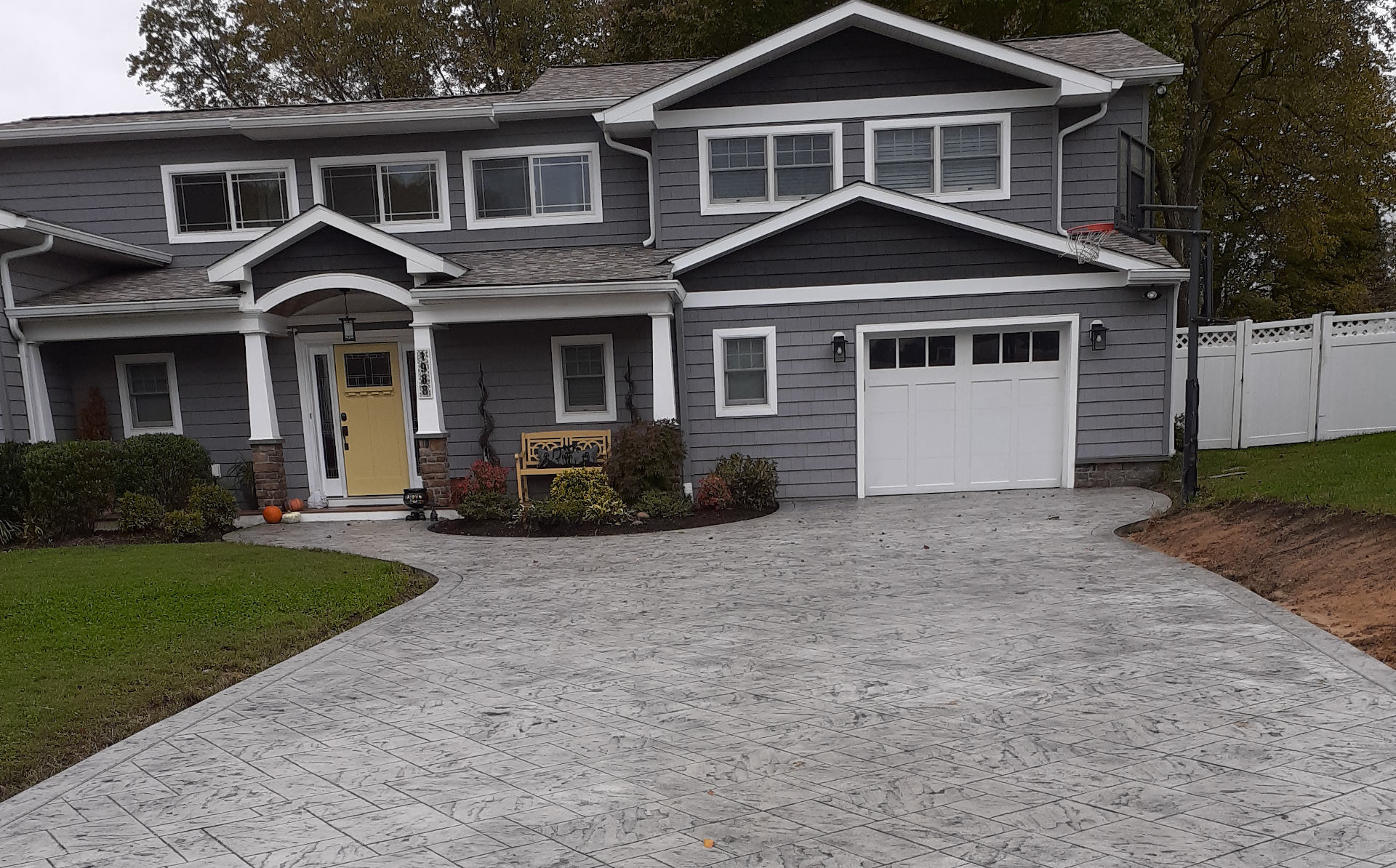 Front view of grey stone stamped concrete